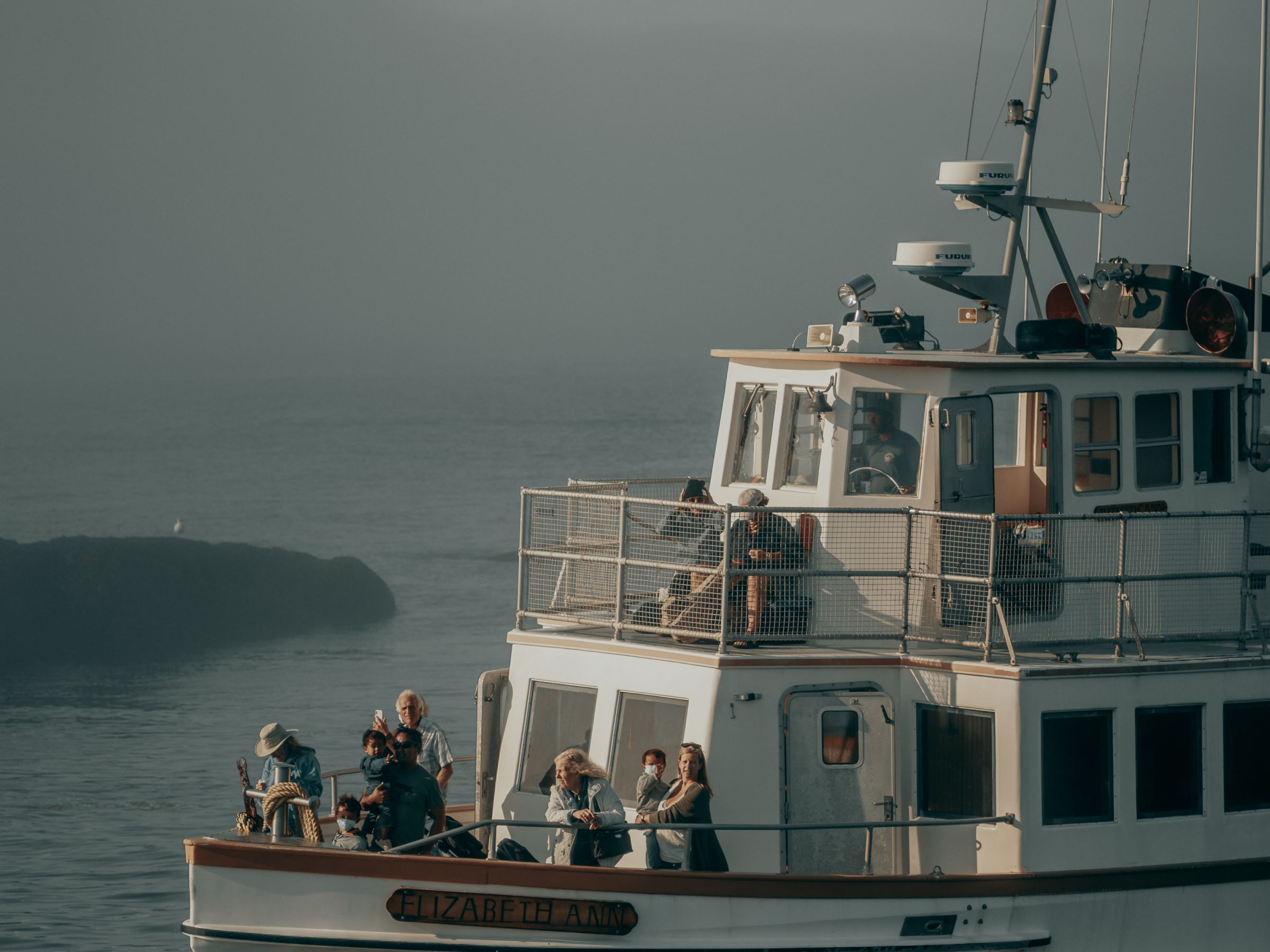 a small boat in a large body of water